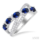 4x3 MM Oval Cut Sapphire and 1/2 Ctw Single Cut Diamond Split Criss-Cross Precious Band in 14K White Gold