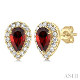 5x3 MM Pear Shape Garnet and 1/8 Ctw Single Cut Diamond Halo Semi-Precious Stud Earrings in 10K Yellow Gold