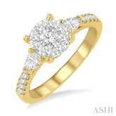 3/4 Ctw Circular Mount Lovebright Pear and Round Cut Diamond Engagement Ring in 14K Yellow and White Gold