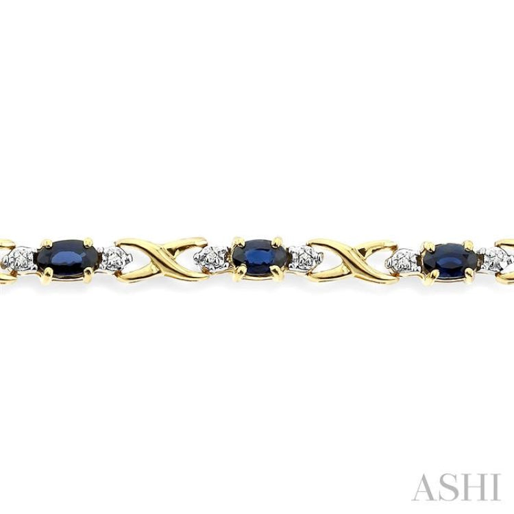 5x3 MM Oval Cut Sapphire and 1/10 Ctw Single Cut Diamond Bracelet in 10K Yellow Gold