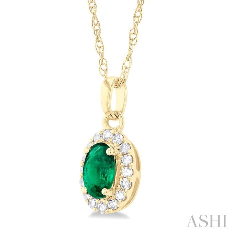 5x3 MM Oval Shape Emerald and 1/20 Ctw Single Cut Diamond Halo Precious Pendant with Chain in 10K Yellow Gold