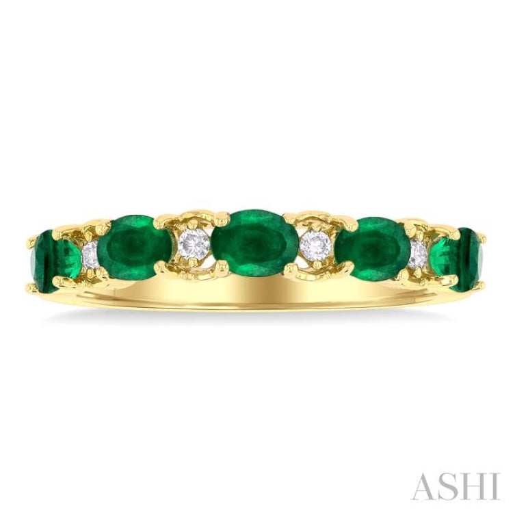 4x3 MM East-West Set Oval Cut Emerald and 1/20 Ctw Round Cut Diamond Precious Band in 14K Yellow Gold