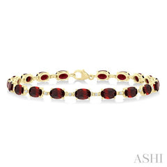 6X4 MM Oval Cut Garnet and 1/6 Ctw Round Cut Diamond Semi-Precious Tennis Bracelet in 10K Yellow Gold