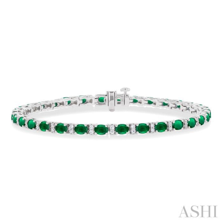 4X3 MM Oval Cut Emerald and 1/3 Ctw Round Cut Diamond Precious Bracelet in 14K White Gold