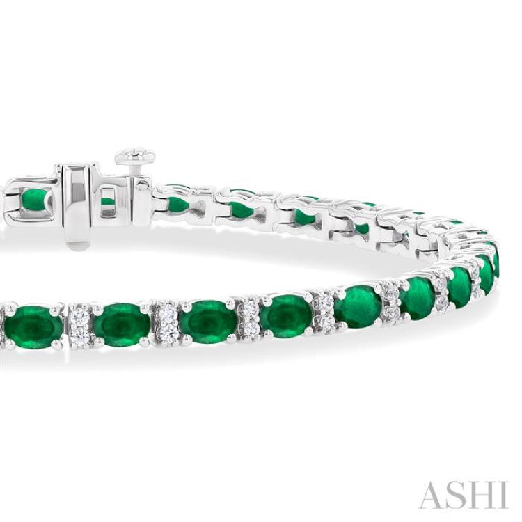 4X3 MM Oval Cut Emerald and 1/3 Ctw Round Cut Diamond Precious Bracelet in 14K White Gold