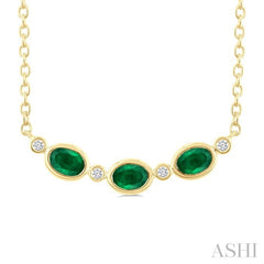 4X3MM Oval Cut Emerald and 1/50 Ctw Bezel Set Round Cut Diamond Precious Fashion Necklace in 10K Yellow Gold
