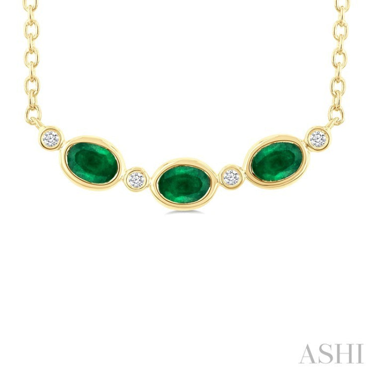 4X3MM Oval Cut Emerald and 1/50 Ctw Bezel Set Round Cut Diamond Precious Fashion Necklace in 10K Yellow Gold