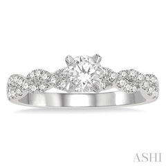 7/8 Ctw Twisted Shank Diamond Engagement Ring With 1/2 Ct Round Cut Center Stone in 14K White Gold