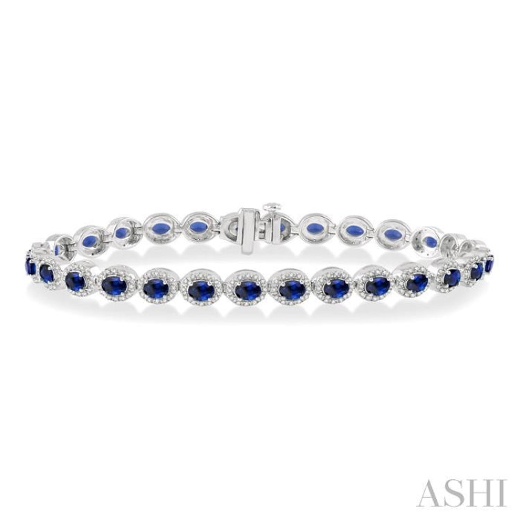 4x3 MM Oval Cut Sapphire and 1 Ctw Round Cut Diamond Precious Bracelet in 14K White Gold
