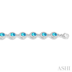 6x4 MM Oval Cut Blue Topaz and 1/10 Ctw Round Cut Diamond Semi-Precious Bracelet in Sterling Silver