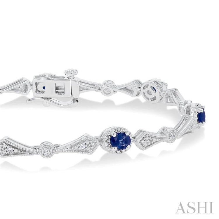 4X3 MM Oval Cut Sapphire and 1/10 Ctw Round Cut Diamond Precious Bracelet in 10K White Gold