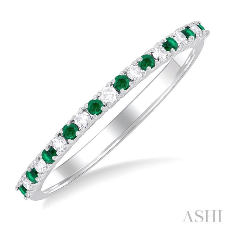 1.35 MM Round Cut Emerald and 1/10 Ctw Petite Round Cut Diamond Precious Stack Band in 10K White Gold