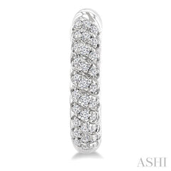 1/5 Ctw Petite Swirl Pattern Round Cut Diamond Fashion Huggies in 10K White Gold