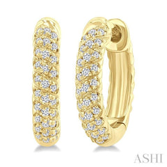 1/5 Ctw Petite Swirl Pattern Round Cut Diamond Fashion Huggies in 10K Yellow Gold