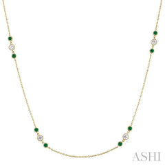 2.25 MM Emerald and 1/2 Ctw Round Cut Diamond Precious Station Necklace in 14K Yellow Gold