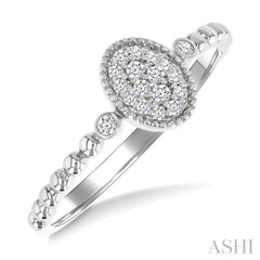 1/8 Ctw Petite Bead Shank Oval Center Round Cut Diamond Fashion Ring in 10K White Gold