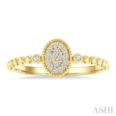 1/8 Ctw Petite Bead Shank Oval Center Round Cut Diamond Fashion Ring in 10K Yellow Gold