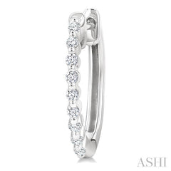 1/6 Ctw Petite Shared Prong Round Cut Diamond Hoop Earrings in Sterling Silver
