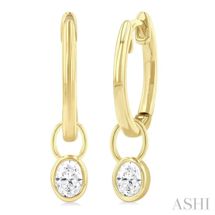 1/3 Ctw Bezel Set Oval Cut Diamond Huggie Earrings in 10K Yellow Gold